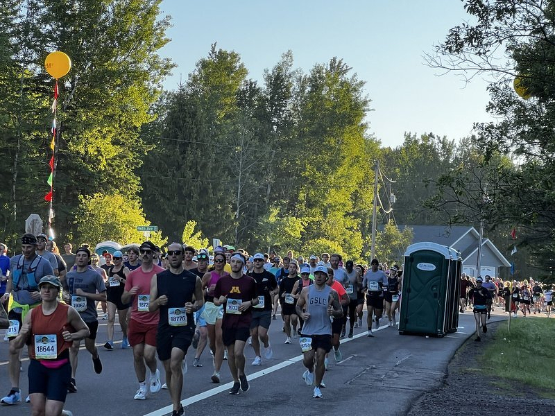 Cheering from the end of the driveway at the 50th Grandma's Marathon