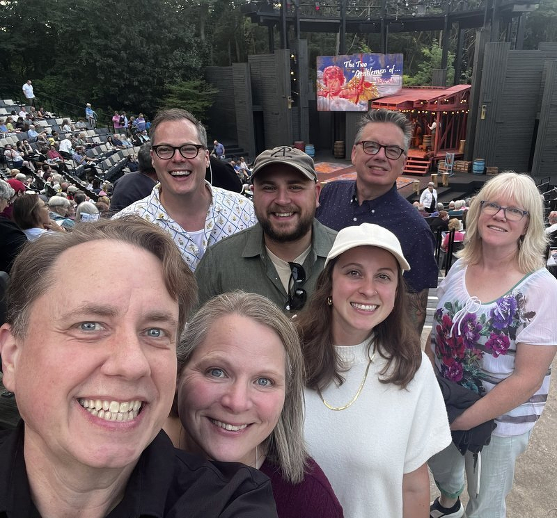 The group posed for a selfie in the seats of the Hill Theatre before a show